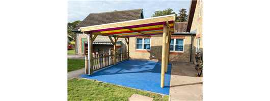 Coloured Roof Pergola with Sky Blue Wetpour Safer Surfacing