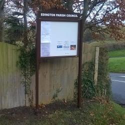 Tradition 30 external notice board with shaped header .