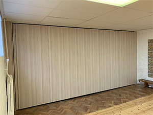 Surrey school approach Moving Designs Ltd to best utilise hall space