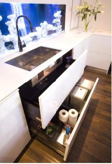 Award winning kitchen with automated touch open drawers and a three-metre long aquarium positioned behind the sink