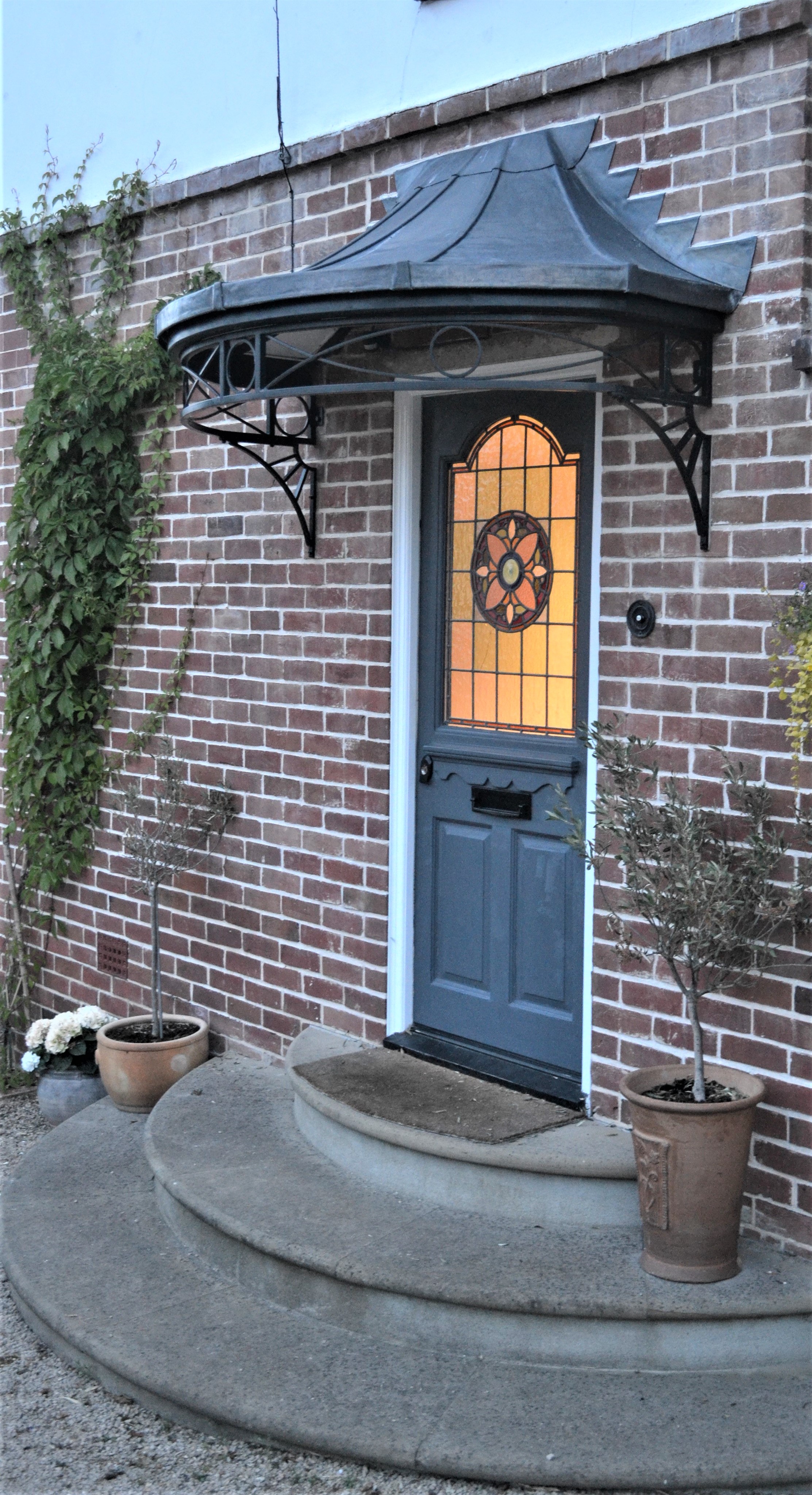 Curved Nouveau Style Canopy with Roof Framework Finished in Lead