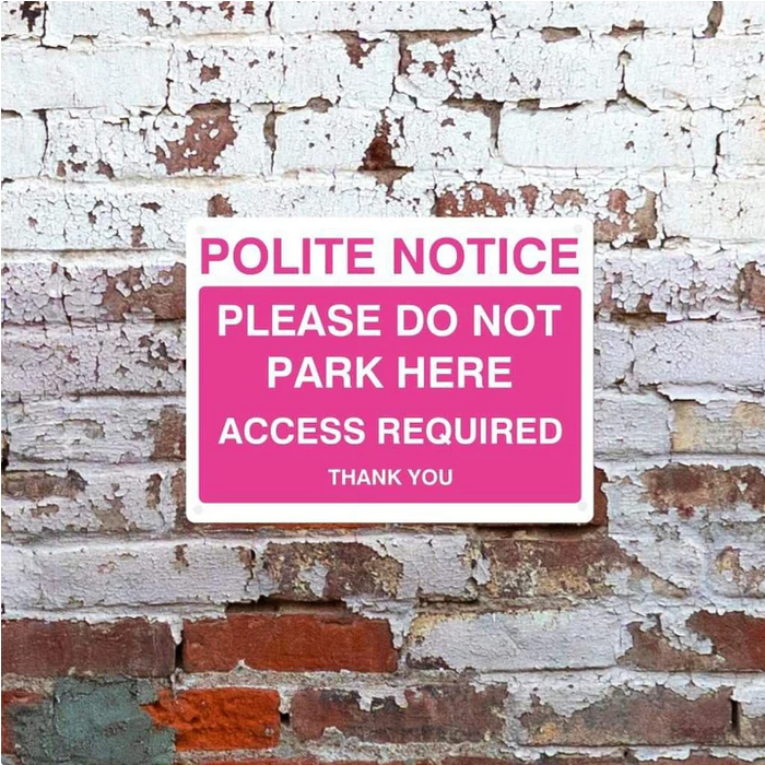 Bright Pink Parking Signs